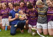 7 May 2018; Wexford manager Anthony Masterson with his daughter Caragh during the celebrations after the Lidl Ladies Football National League Division 3 Final match between Meath and Wexford at St Brendan's Park, in Birr, Offaly.  Photo by Piaras Ó Mídheach/Sportsfile