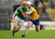 7 May 2018; Seamus Flanagan of Limerick in action against Ross Hayes of Clare during the Bord Gáis Energy Munster GAA Hurling U21 Championship quarter-final match between Clare and Limerick at Cusack Park in Ennis, Clare. Photo by Eóin Noonan/Sportsfile