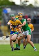 7 May 2018; Billy Connors of Clare in action against Thomas Grimes of Limerick during the Bord Gáis Energy Munster GAA Hurling U21 Championship quarter-final match between Clare and Limerick at Cusack Park in Ennis, Clare. Photo by Eóin Noonan/Sportsfile