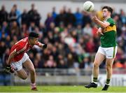 8 May 2018; Jack O'Connor of Kerry scores the winning point for his side despite the efforts of Joseph O'Shea of Cork during the Electric Ireland Munster GAA Football Minor Championship semi-final match between Kerry and Cork at Austin Stack Park, in Tralee, Kerry.  Photo by Eóin Noonan/Sportsfile