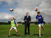 10 May 2018; Republic of Ireland manager, Martin O’Neill pictured with Elle Muprhy, age 12, from Scoil Cholmcille, Skryne, Meath and Charlie Bacon, age 12, Bunscoil Réalt na Mara at the SPAR FAI Primary Schools 5s Programme Leinster Finals in the MDL Grounds, Navan, Co. Meath.  The six finalists will progress to the SPAR FAI Primary School 5s Programme National Finals in Aviva Stadium on May 30th. For further information please see www.SPAR.ie or www.FAIschools.ie Photo by Eóin Noonan/Sportsfile