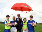 10 May 2018; Republic of Ireland manager, Martin O’Neill pictured with, from left, Caelem Tunstead age 12 from Bunscoil Réalt na Mara, Roisin McManus, age 12, from Scoil Cholmcille, Skryne, Meath, Elle Muprhy, age 12, from Scoil Cholmcille, Skryne, Meath and Charlie Bacon, age 12, from Bunscoil Réalt na Mara at the SPAR FAI Primary Schools 5s Programme Leinster Finals in the MDL Grounds, Navan, Co. Meath.  The six finalists will progress to the SPAR FAI Primary School 5s Programme National Finals in Aviva Stadium on May 30th. For further information please see www.SPAR.ie or www.FAIschools.ie Photo by Eóin Noonan/Sportsfile