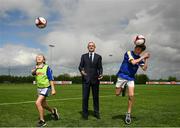 10 May 2018; Republic of Ireland manager, Martin O’Neill pictured with Elle Muprhy, age 12, from Scoil Cholmcille, Skryne, Meath and Charlie Bacon, age 12, Bunscoil Réalt na Mara at the SPAR FAI Primary Schools 5s Programme Leinster Finals in the MDL Grounds, Navan, Co. Meath.  The six finalists will progress to the SPAR FAI Primary School 5s Programme National Finals in Aviva Stadium on May 30th. For further information please see www.SPAR.ie or www.FAIschools.ie Photo by Eóin Noonan/Sportsfile