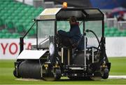 11 May 2018; A groundsman clears water from the outfield shortly before play is abandoned on day one of the International Cricket Test match between Ireland and Pakistan at Malahide, in Co. Dublin. Photo by Seb Daly/Sportsfile