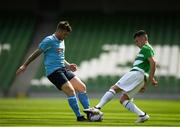 12 May 2018; Paddy O'Malley of Pike Rovers in action against Kyle Dempsey of North End United during the FAI New Balance Junior Cup Final match between Pike Rovers and North End United at the Aviva Stadium in Dublin. Photo by Eóin Noonan/Sportsfile