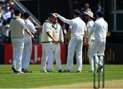 12 May 2018; Paul Stirling of Ireland, centre, is congratulated by team-mates after catching Babar Azam of Pakistan in the slips, off a delivery from Tim Murtagh, during day two of the International Cricket Test match between Ireland and Pakistan at Malahide, in Co. Dublin. Photo by Seb Daly/Sportsfile