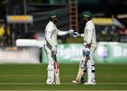 12 May 2018; Pakistan batsmen Shadab Khan, left, and Faheem Ashraf, right, during day two of the International Cricket Test match between Ireland and Pakistan at Malahide, in Co. Dublin. Photo by Seb Daly/Sportsfile