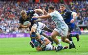 12 May 2018; Dan Leavy of Leinster is tackled by Yannick Nyanga of Racing 92 during the European Rugby Champions Cup Final match between Leinster and Racing 92 at the San Mames Stadium in Bilbao, Spain. Photo by Ramsey Cardy/Sportsfile