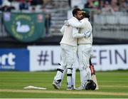 12 May 2018; Faheem Ashraf of Pakistan, left, is congratulated by team-mate Shadab Khan after bringing up his half century during day two of the International Cricket Test match between Ireland and Pakistan at Malahide, in Co. Dublin. Photo by Seb Daly/Sportsfile