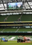 12 May 2018; Both teams stand for the playing of the National Anthem ahead of the FAI New Balance Intermediate Cup Final match between Firhouse Clover and Maynooth University Town at the Aviva Stadium in Dublin. Photo by Eóin Noonan/Sportsfile
