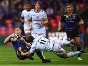 12 May 2018; Luke McGrath of Leinster is tackled by Marc Andreu of Racing 92 during the European Rugby Champions Cup Final match between Leinster and Racing 92 at the San Mames Stadium in Bilbao, Spain. Photo by Stephen McCarthy/Sportsfile