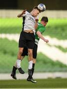 12 May 2018; Jake Corrigan of Maynooth University Town in action against Gerry Bambrick of Firhouse Clover during the FAI New Balance Intermediate Cup Final match between Firhouse Clover and Maynooth University Town at the Aviva Stadium in Dublin. Photo by Eóin Noonan/Sportsfile