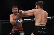 12 May 2018; Daniel Olejniczak, left, in action against Steve Owens during their Welterweight bout at BAMMA 35 at the 3 Arena in Dublin. Photo by David Fitzgerald/Sportsfile