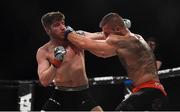 12 May 2018; Steve Owens, left, in action against Daniel Olejniczak during their Welterweight bout at BAMMA 35 at the 3 Arena in Dublin. Photo by David Fitzgerald/Sportsfile