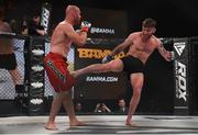 12 May 2018; Myles Price, right, in action against Phil Raeburn during their lightweight bout at BAMMA 35 at the 3 Arena in Dublin. Photo by David Fitzgerald/Sportsfile