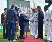 13 May 2018; President of Ireland Michael D Higgins shakes hands with Ireland captain William Porterfield as he meets the players prior to play on day three of the International Cricket Test match between Ireland and Pakistan at Malahide, in Co. Dublin. Photo by Seb Daly/Sportsfile