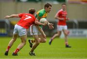 13 May 2018; Seán Gannon of Carlow in action against Anthony Williams of Louth during the Leinster GAA Football Senior Championship Preliminary Round match between Louth and Carlow at O'Moore Park in Laois. Photo by Piaras Ó Mídheach/Sportsfile
