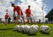 13 May 2018; Louth players Ciarán Downey, left, and Sam Mulroy during the warm-up before the Leinster GAA Football Senior Championship Preliminary Round match between Louth and Carlow at O'Moore Park in Laois. Photo by Piaras Ó Mídheach/Sportsfile