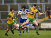 13 May 2018; Jason Irwin of Monaghan in action against Shane O'Donnell of Donegal during the 2018 Ulster GAA Football U17 Championship Qualifiers Round 2 match between Donegal and Monaghan at Pairc MacCumhaill in Donegal. Photo by Philip Fitzpatrick/Sportsfile