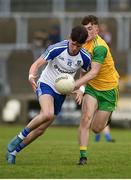 13 May 2018; Jason Irwin of Monaghan in action against Shane O'Donnell of Donegal during the 2018 Ulster GAA Football U17 Championship Qualifiers Round 2 match between Donegal and Monaghan at Páirc MacCumhaill in Donegal.Photo by Philip Fitzpatrick/Sportsfile