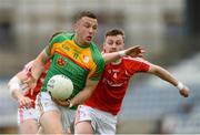 13 May 2018; Darragh Foley of Carlow in action against James Craven of Louth during the Leinster GAA Football Senior Championship Preliminary Round match between Louth and Carlow at O'Moore Park in Laois. Photo by Piaras Ó Mídheach/Sportsfile