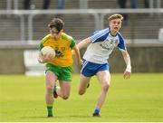 13 May 2018; Dylan Doogan in action against Karl Gallagher of Monaghan during the 2018 Ulster GAA Football U17 Championship Qualifiers Round 2 match between Donegal and Monaghan at Páirc MacCumhaill in Donegal. Photo by Oliver McVeigh/Sportsfile