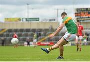 13 May 2018; Daniel St Ledger of Carlow kicks a point during the Leinster GAA Football Senior Championship Preliminary Round match between Louth and Carlow at O'Moore Park in Laois. Photo by Harry Murphy/Sportsfile