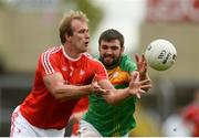 13 May 2018; Conor Grimes of Louth in action against Seán Murphy of Carlow during the Leinster GAA Football Senior Championship Preliminary Round match between Louth and Carlow at O'Moore Park in Laois. Photo by Piaras Ó Mídheach/Sportsfile