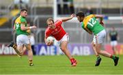 13 May 2018; Conor Grimes of Louth  in action against Eoghan Ruth of Carlow during the Leinster GAA Football Senior Championship Preliminary Round match between Louth and Carlow at O'Moore Park in Laois. Photo by Harry Murphy/Sportsfile