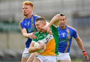 13 May 2018; Anton Sullivan of Offaly in action against John Crowe of Wicklow during the Leinster GAA Football Senior Championship Preliminary Round match between Offaly and Wicklow at O'Moore Park in Laois. Photo by Harry Murphy/Sportsfile