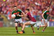 13 May 2018; Kevin McLoughlin of Mayo in action against Shane Walsh of Galway during the Connacht GAA Football Senior Championship Quarter-Final match between Mayo and Galway at Elvery's MacHale Park in Mayo. Photo by Eóin Noonan/Sportsfile