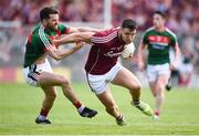 13 May 2018; Damien Comer of Galway in action against Chris Barrett of Mayo during the Connacht GAA Football Senior Championship Quarter-Final match between Mayo and Galway at Elvery's MacHale Park in Mayo. Photo by David Fitzgerald/Sportsfile