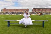13 May 2018; Róisín Corcoran, age 7, daughter of Carlow goalkeeping coach John Corcoran, in her Communion dress after the Leinster GAA Football Senior Championship Preliminary Round match between Louth and Carlow at O'Moore Park in Laois. Photo by Piaras Ó Mídheach/Sportsfile