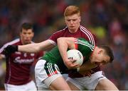13 May 2018; Andy Moran of Mayo is tackled by Sean Andy Ó'Ceallaigh of Galway during the Connacht GAA Football Senior Championship Quarter-Final match between Mayo and Galway at Elvery's MacHale Park in Mayo. Photo by Eóin Noonan/Sportsfile
