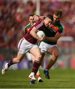13 May 2018; Eamonn Brannigan of Galway in action against Aidan O'Shea of Mayo during the Connacht GAA Football Senior Championship Quarter-Final match between Mayo and Galway at Elvery's MacHale Park in Mayo. Photo by Eóin Noonan/Sportsfile