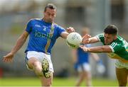13 May 2018; Ciarán Hyland of Wicklow is blocked down by Ruairí McNamee of Offaly during the Leinster GAA Football Senior Championship Preliminary Round match between Offaly and Wicklow at O'Moore Park in Laois. Photo by Piaras Ó Mídheach/Sportsfile
