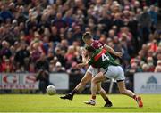 13 May 2018; Johnny Heaney of Galway scores his side's first goal of the game despite the efforts of Keith Higgins of Mayo during the Connacht GAA Football Senior Championship Quarter-Final match between Mayo and Galway at Elvery's MacHale Park in Mayo. Photo by Eóin Noonan/Sportsfile