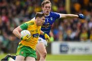 13 May 2018; Jamie Brennan of Donegal in action against Padraig Faulkner of Cavan during the Ulster GAA Football Senior Championship Preliminary Round match between Donegal and Cavan at Páirc MacCumhaill in Donegal. Photo by Oliver McVeigh/Sportsfile