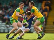13 May 2018; Ryan Connolly of Cavan in action against Hugh McFadden and Ciaran McGinley of Donegal during the Ulster GAA Football Senior Championship Preliminary Round match between Donegal and Cavan at Páirc MacCumhaill in Donegal. Photo by Oliver McVeigh/Sportsfile