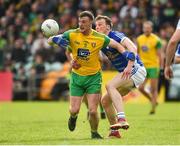 13 May 2018; Leo McLoone of Donegal in action against Gearoid McKiernan of Cavan during the Ulster GAA Football Senior Championship Preliminary Round match between Donegal and Cavan at Páirc MacCumhaill in Donegal. Photo by Oliver McVeigh/Sportsfile