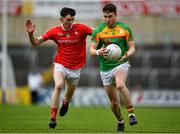 13 May 2018; Ciarán Moran of Carlow in action against Ciarán Downey of Louth during the Leinster GAA Football Senior Championship Preliminary Round match between Louth and Carlow at O'Moore Park in Laois. Photo by Harry Murphy/Sportsfile