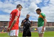 13 May 2018; Referee Niall Cullen speaks with Louth captain Andy McDonnell and Carlow captain John Murphy prior to the Leinster GAA Football Senior Championship Preliminary Round match between Louth and Carlow at O'Moore Park in Laois. Photo by Harry Murphy/Sportsfile