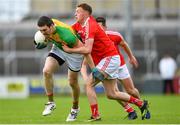 13 May 2018; Conor Lawlor of Carlow in action against Ryan Burns of Louth during the Leinster GAA Football Senior Championship Preliminary Round match between Louth and Carlow at O'Moore Park in Laois. Photo by Harry Murphy/Sportsfile