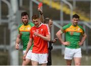 13 May 2018; Ryan Burns of Louth is shown the red card by referee Niall Cullen during the Leinster GAA Football Senior Championship Preliminary Round match between Louth and Carlow at O'Moore Park in Laois. Photo by Piaras Ó Mídheach/Sportsfile