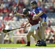 10 August 2003; Michael Donnellan, Galway, in action against Tipperary's Kieran Bergin. All-Ireland Minor Hurling Championship Semi-Final, Galway v Tipperary, Croke Park, Dublin. Picture credit; Ray McManus / SPORTSFILE *EDI*