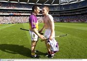 16 August 2003; Joe Deane, Cork, shakes hands with Wexford's Liam Dunne at the final whistle. Guinness All-Ireland Senior Hurling Championship Semi-Final replay, Cork v Wexford, Croke Park, Dublin. Picture credit; Damien Eagers / SPORTSFILE *EDI*