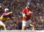 16 August 2003; Ronan Curran, Cork, in action against Wexford's Paul Codd. Guinness All-Ireland Senior Hurling Championship Semi-Final replay, Cork v Wexford, Croke Park, Dublin. Picture credit; Damien Eagers / SPORTSFILE *EDI*