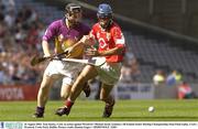 16 August 2003; Tom Kenny, Cork, in action against Wexford's Michael Jacob. Guinness All-Ireland Senior Hurling Championship Semi-Final replay, Cork v Wexford, Croke Park, Dublin. Picture credit; Damien Eagers / SPORTSFILE *EDI*