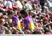 16 August 2003; Wexford fans leave the ground with about 8 minutes to go. Guinness All-Ireland Senior Hurling Championship Semi-Final replay, Cork v Wexford, Croke Park, Dublin. Picture credit; Ray McManus / SPORTSFILE *EDI*