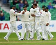 14 May 2018; Mohammad Amir of Pakistan, centre, is congratulated by team-mates after bowling out Niall O'Brien of Ireland during day four of the International Cricket Test match between Ireland and Pakistan at Malahide, in Co. Dublin. Photo by Seb Daly/Sportsfile